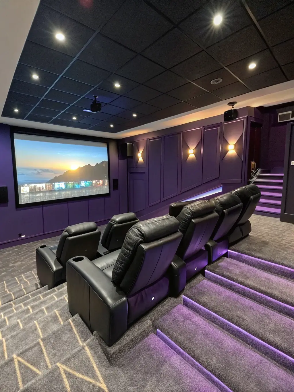 Spacious digital gaming theater with stepped flooring, theater-style recliners, smart glass partition for streaming, acoustic fabric wall in deep purple, premium charcoal carpet, and synchronized RGB lighting system.